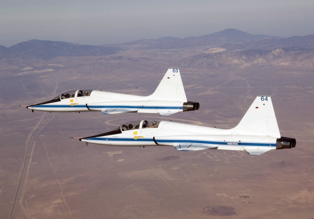 Two T-38A mission support aircraft fly in tight formation Canvas Art - Stocktrek Images (34 x 24)