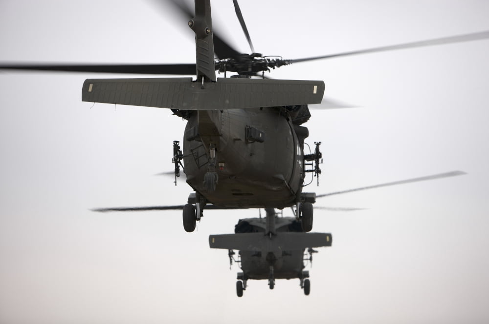 Two UH-60 Black Hawks underway on a mission over northern Iraq Canvas Art - Terry MooreStocktrek Images (35 x 23)
