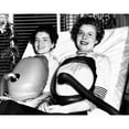 thumbnail image 1 of Two Women Polio Victims Using Chest Respirators That Free Them From The Iron Lung. Both Were Stricken In 1953. July 16, 1 of 2