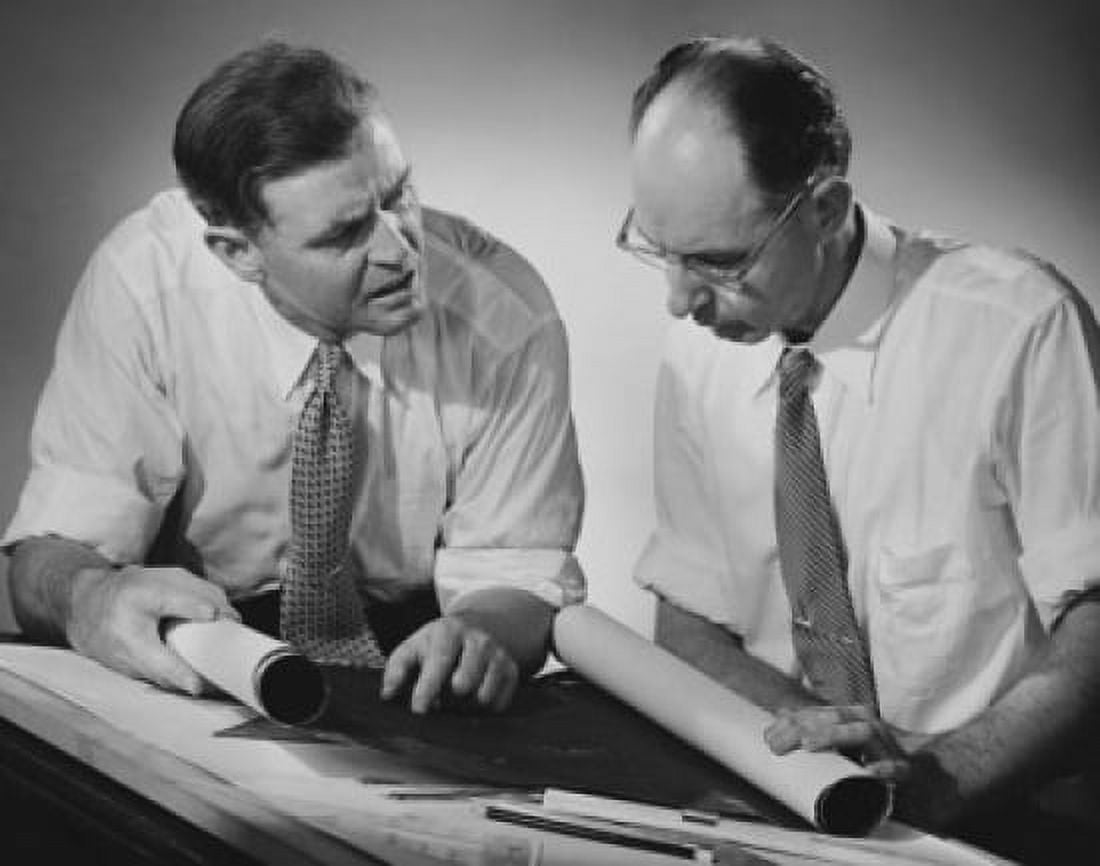 Two architects discussing a blueprint Canvas Art - (24 x 36)