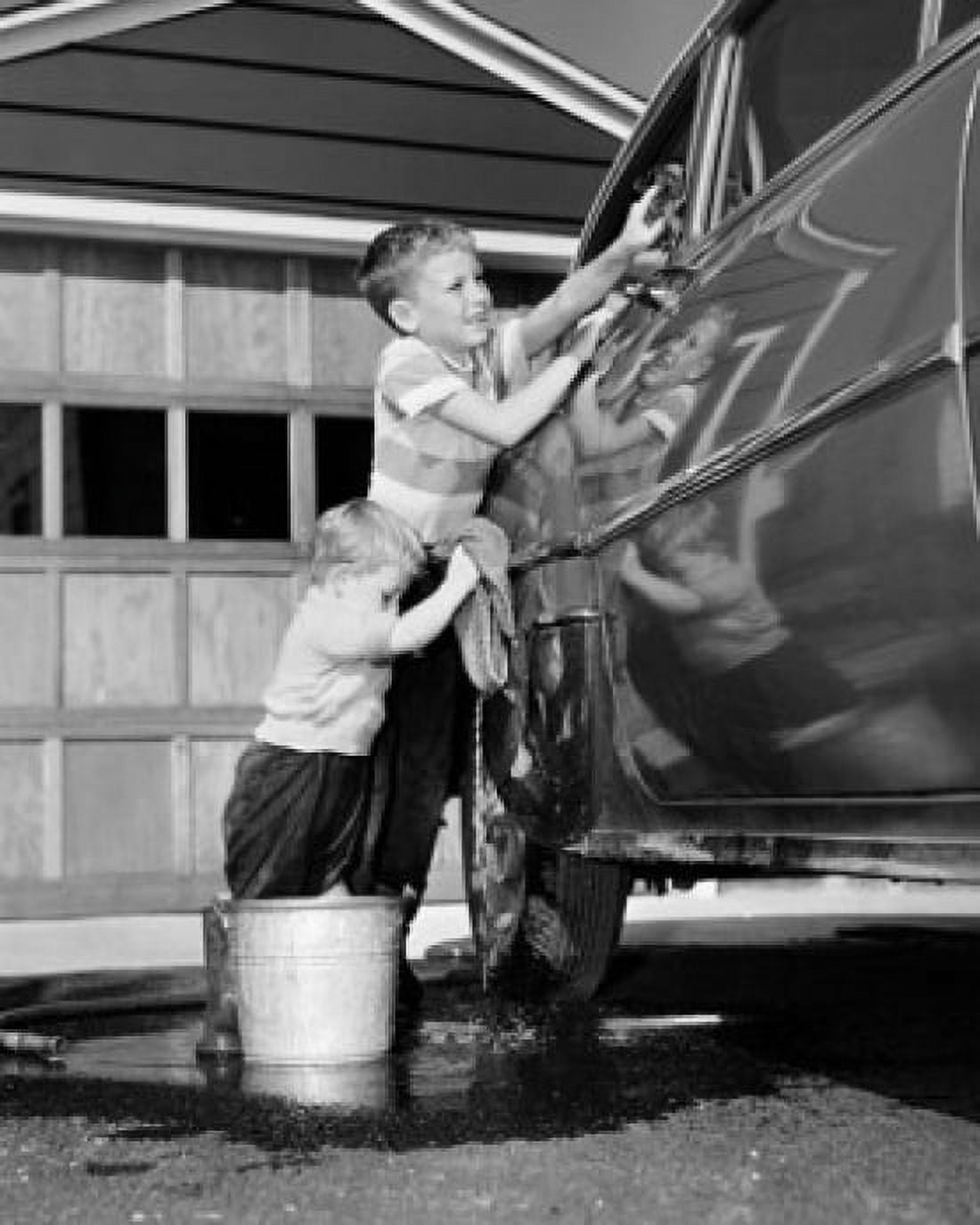Two boys cleaning a car Canvas Art - (18 x 24)