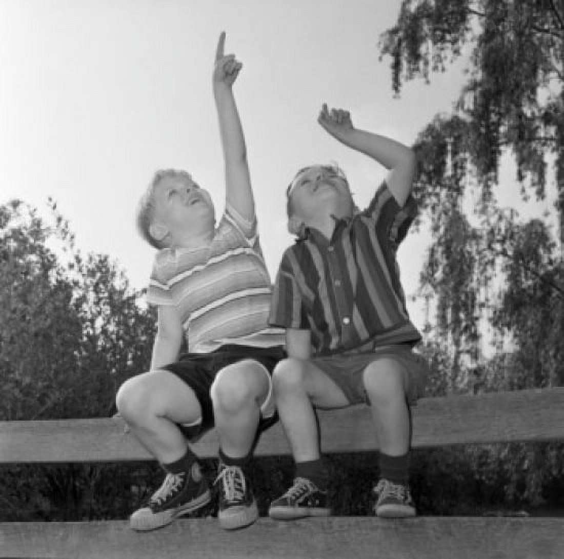 Two boys pointing to sky Canvas Art - (24 x 36)