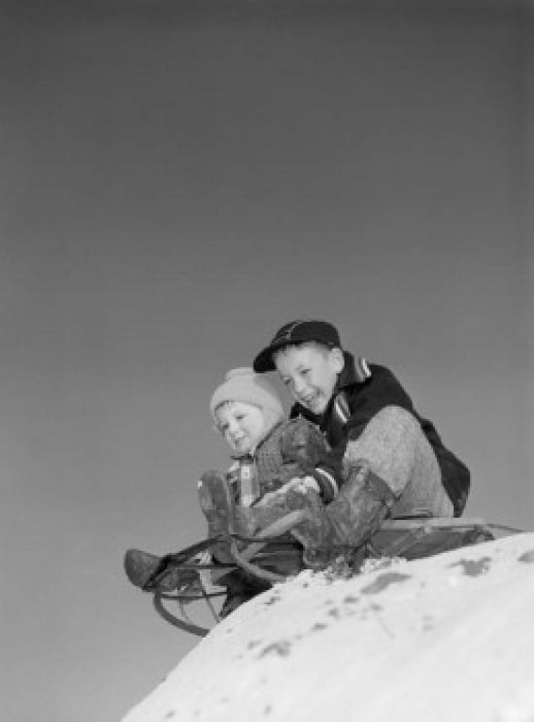 Two boys sitting on sled Canvas Art - (18 x 24)