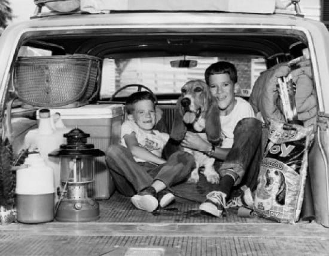 Two boys sitting with their dog in the back of a station wagon Canvas Art - (24 x 36)