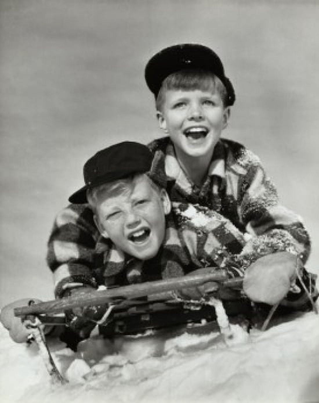Two boys sliding on a sled Canvas Art - (18 x 24)