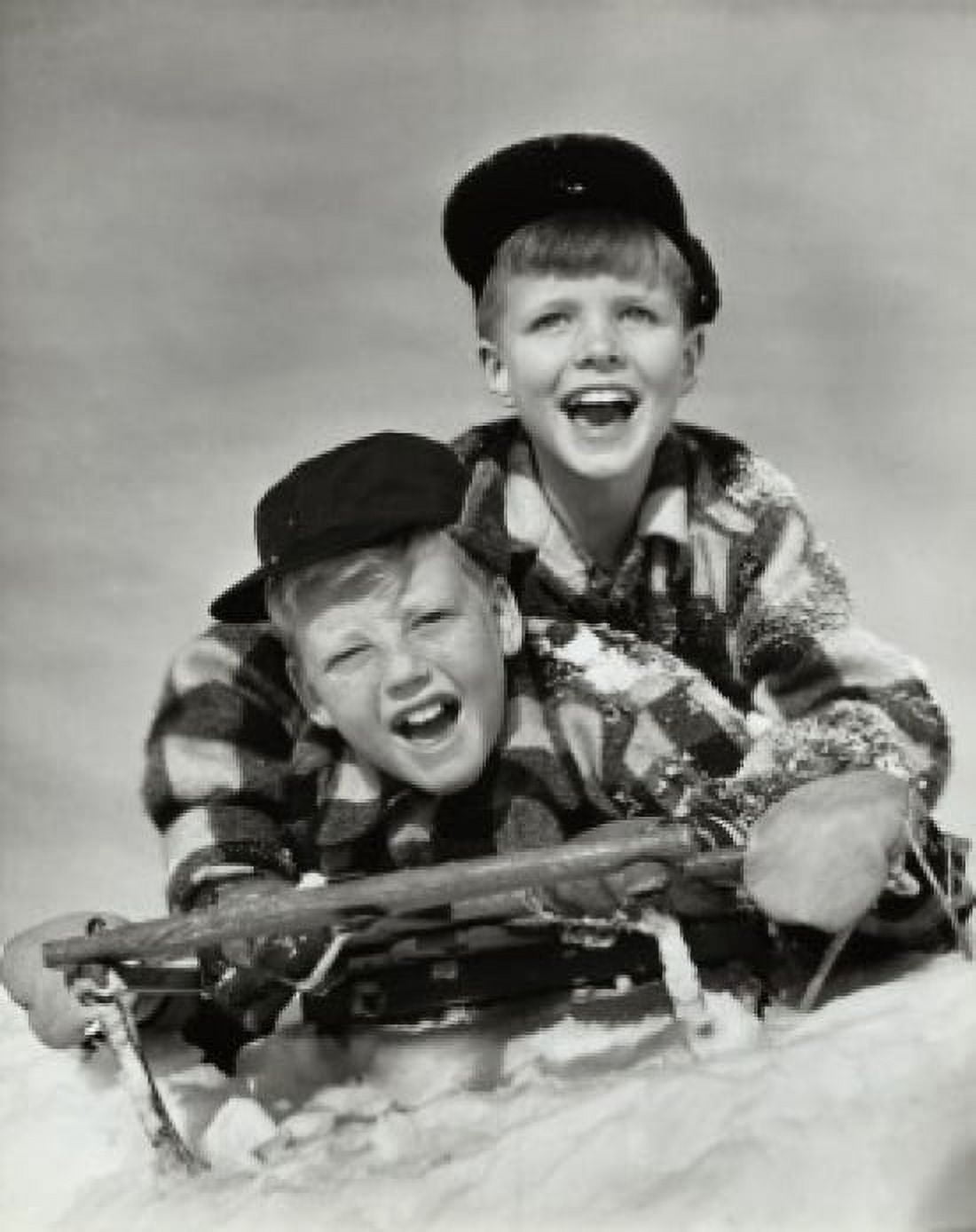 Two boys sliding on a sled Canvas Art - (24 x 36)