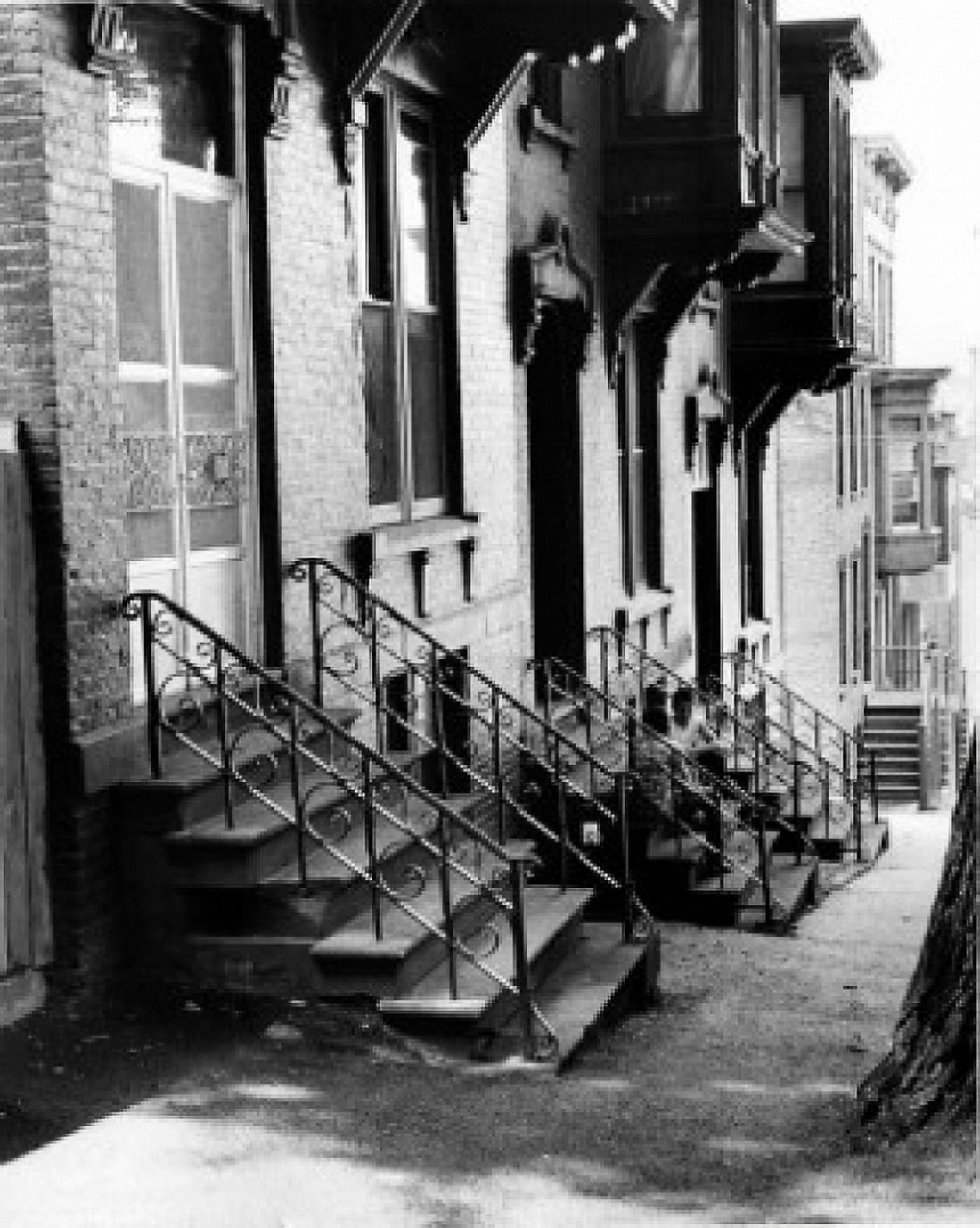 Two boys talking on front stoop Canvas Art - (24 x 36)