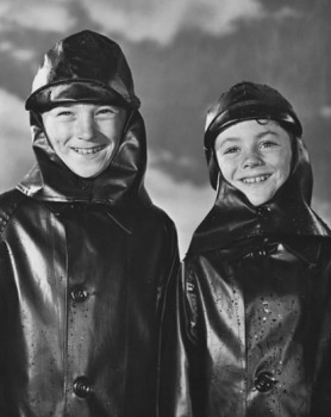 Two boys wearing raincoats and smiling Canvas Art - (18 x 24)