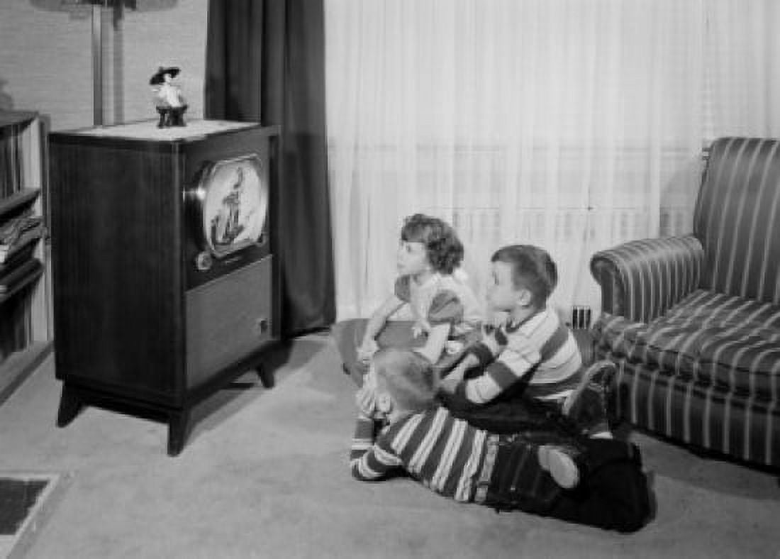 Two brothers and sister watching television Canvas Art - (18 x 24)