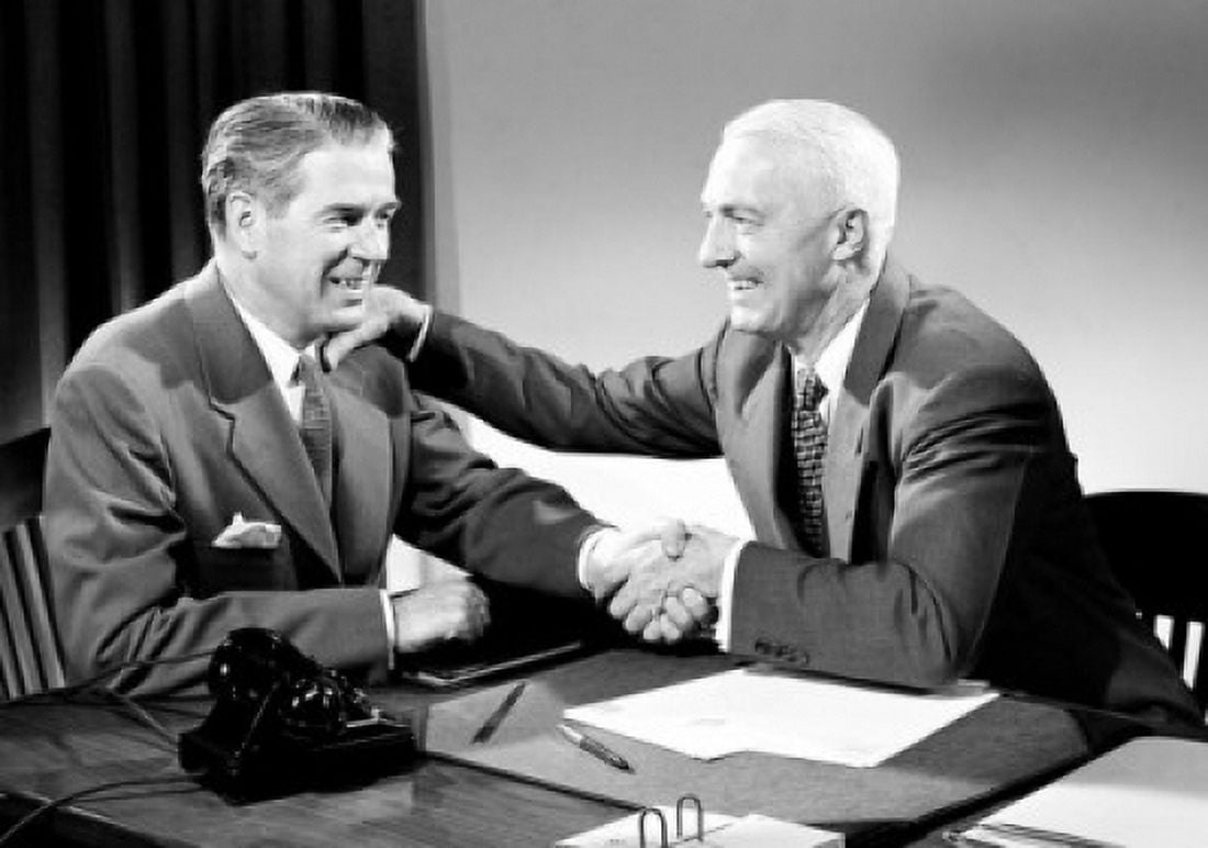 Two business men shaking hands in office Canvas Art -  (24 x 36)