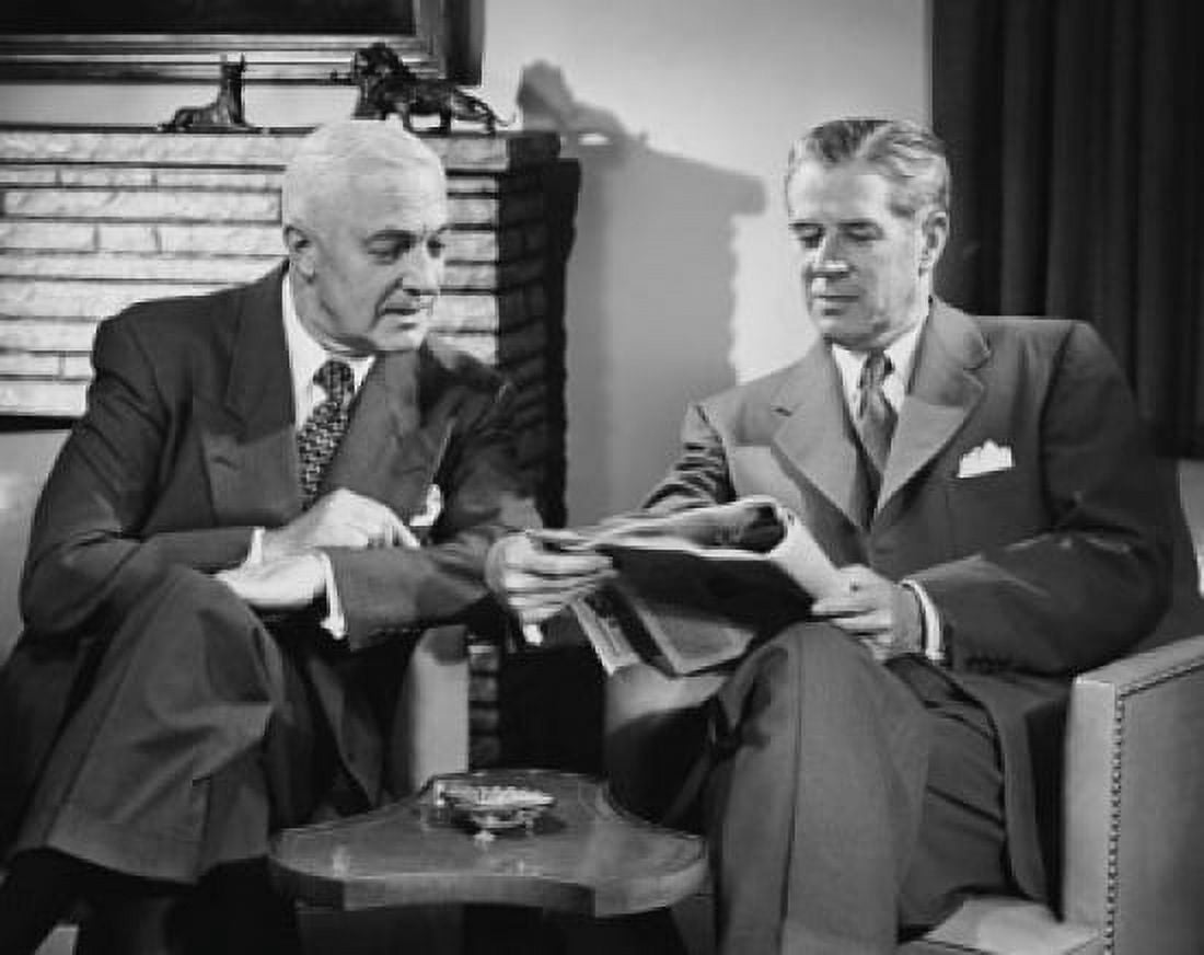 Two businessmen reading a magazine Canvas Art - (18 x 24)