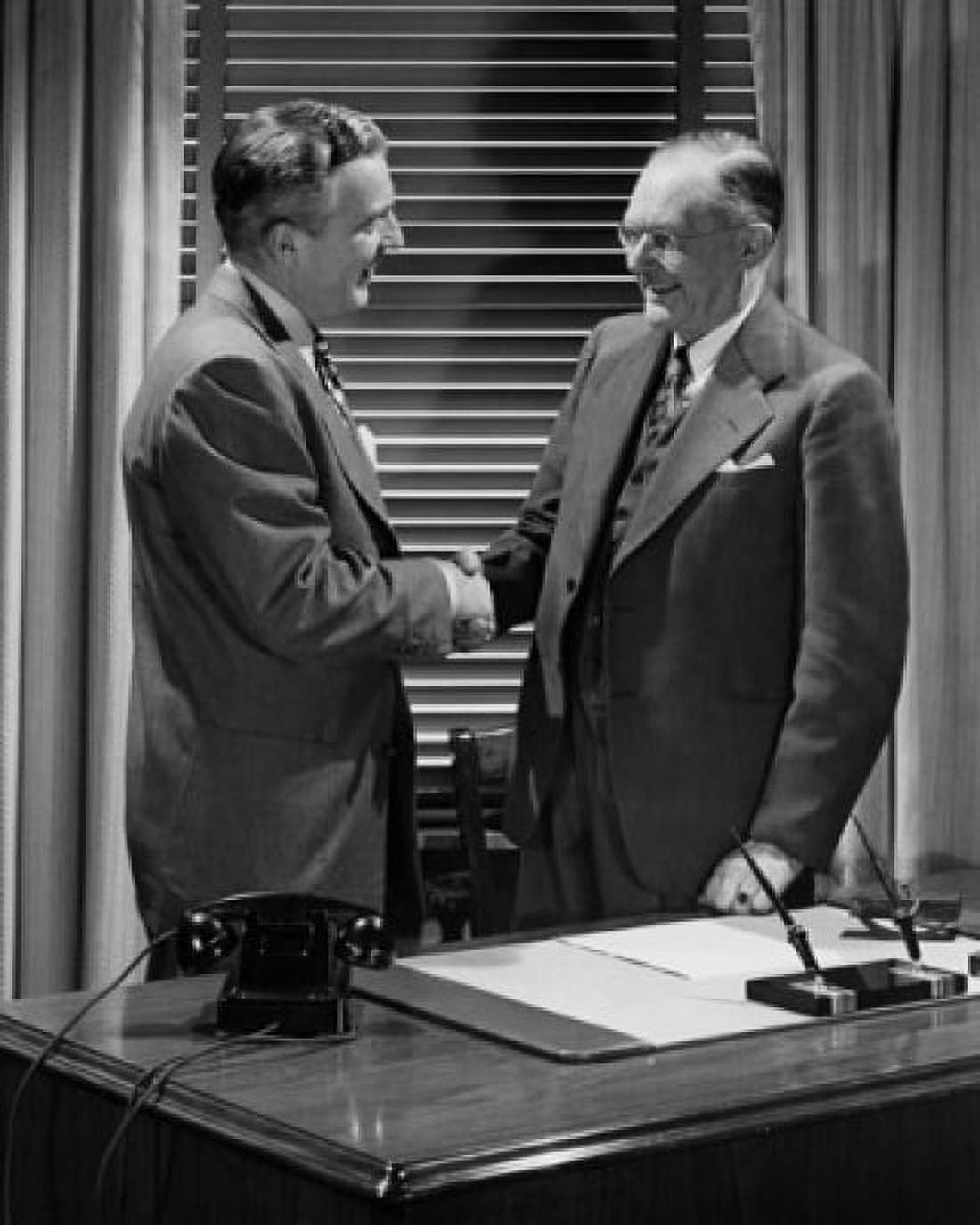 Two businessmen shaking hands Canvas Art - (18 x 24)