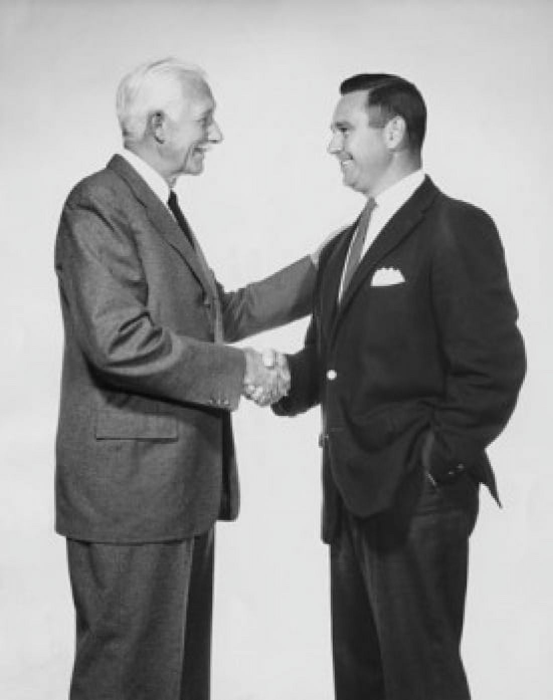 Two businessmen shaking hands Canvas Art - (24 x 36)