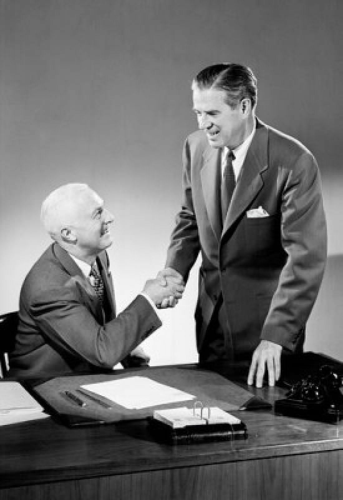 Two businessmen shaking hands in an office Canvas Art - (18 x 24)