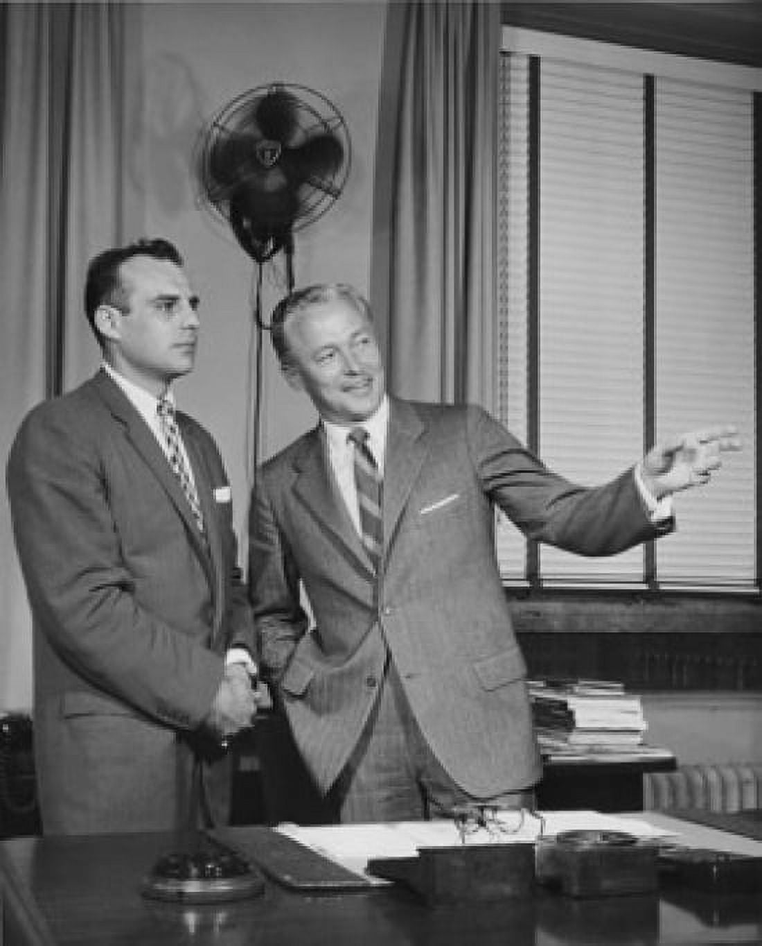 Two businessmen standing in office Canvas Art - (24 x 36)