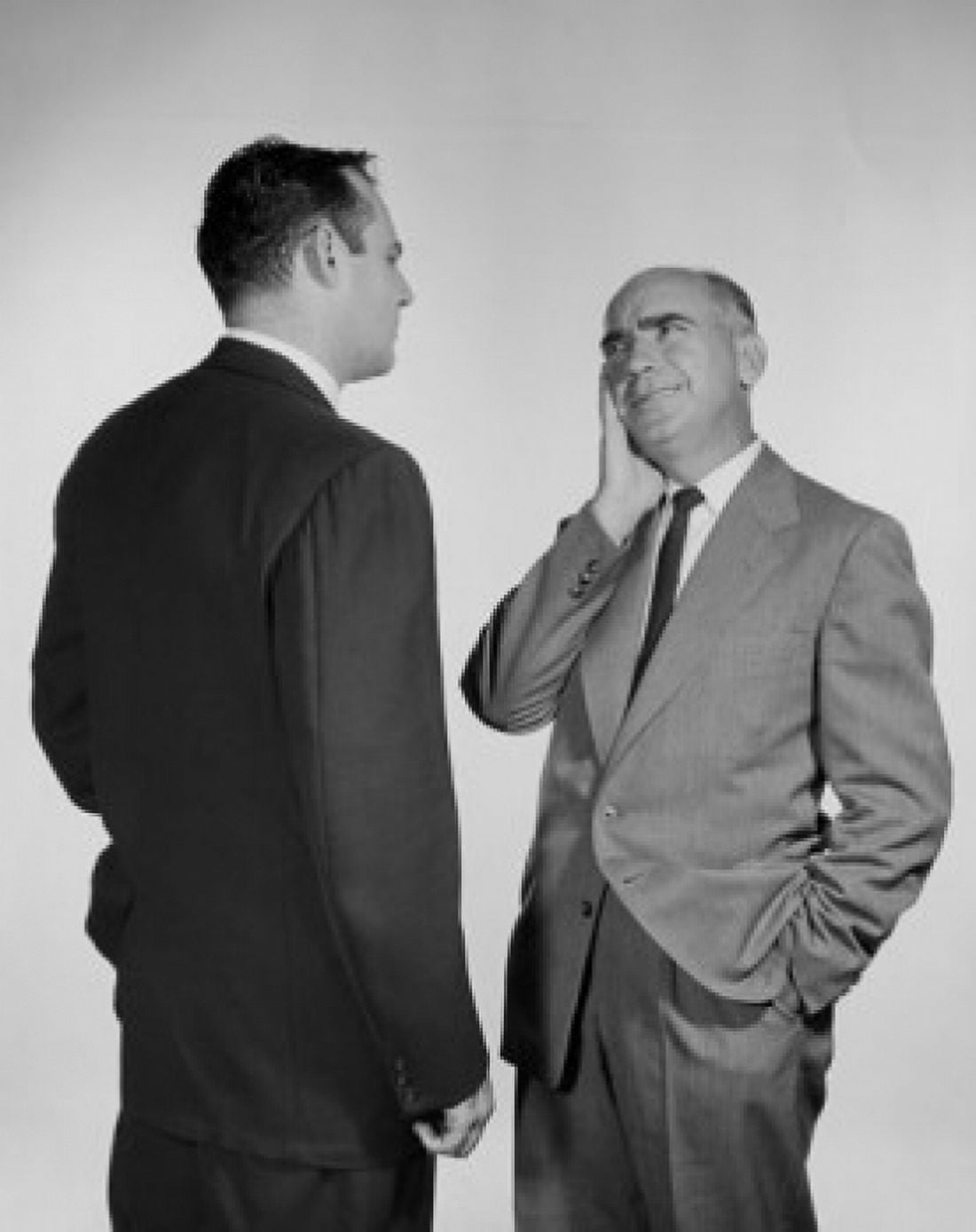 Two businessmen talking Canvas Art - (18 x 24)