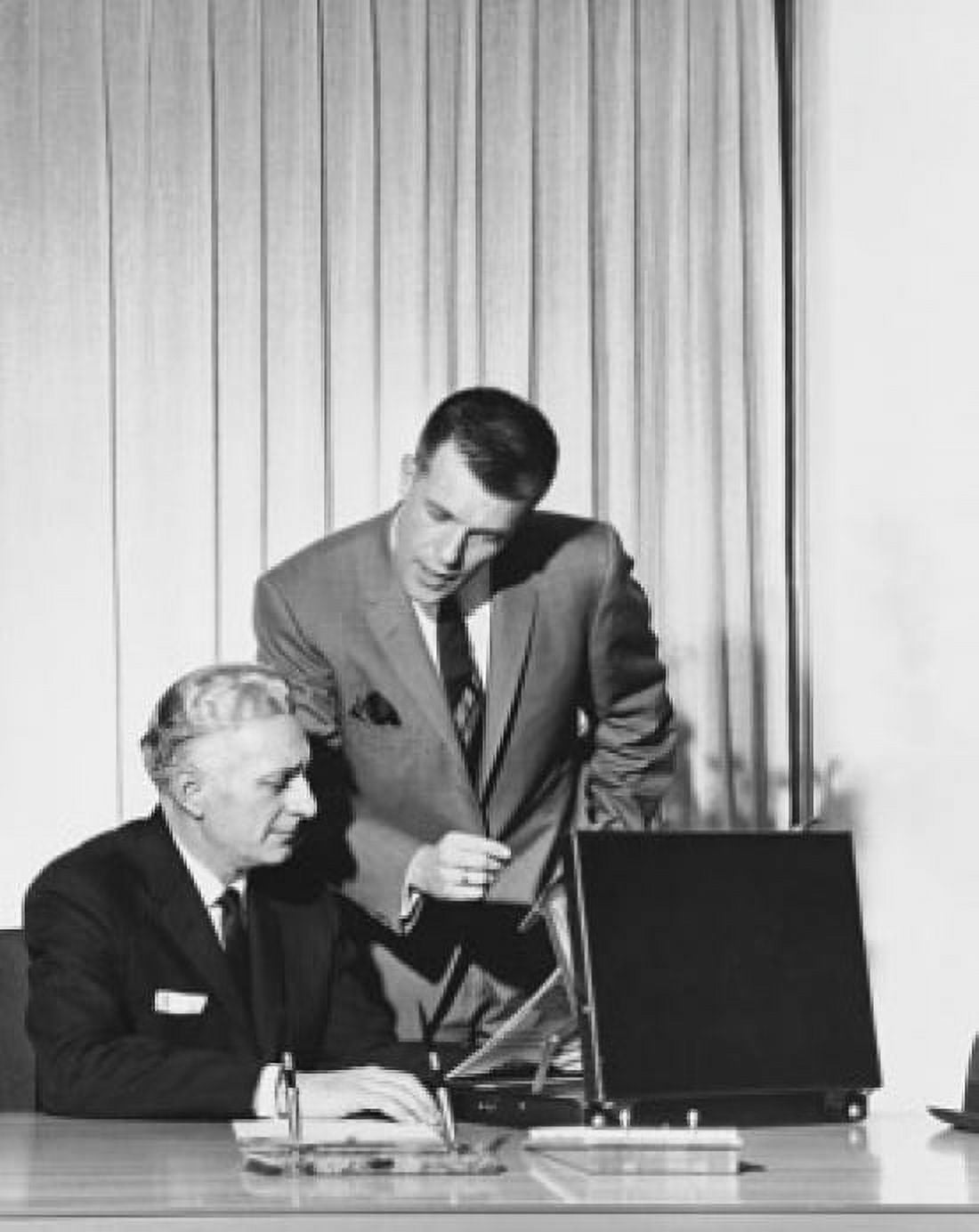 Two businessmen talking in an office Canvas Art - (18 x 24)