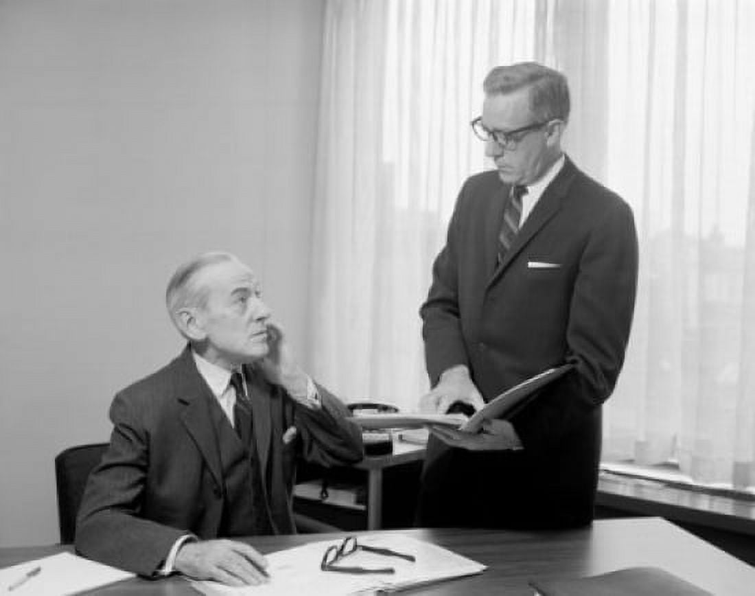 Two businessmen talking to each other in an office Canvas Art - (18 x 24)