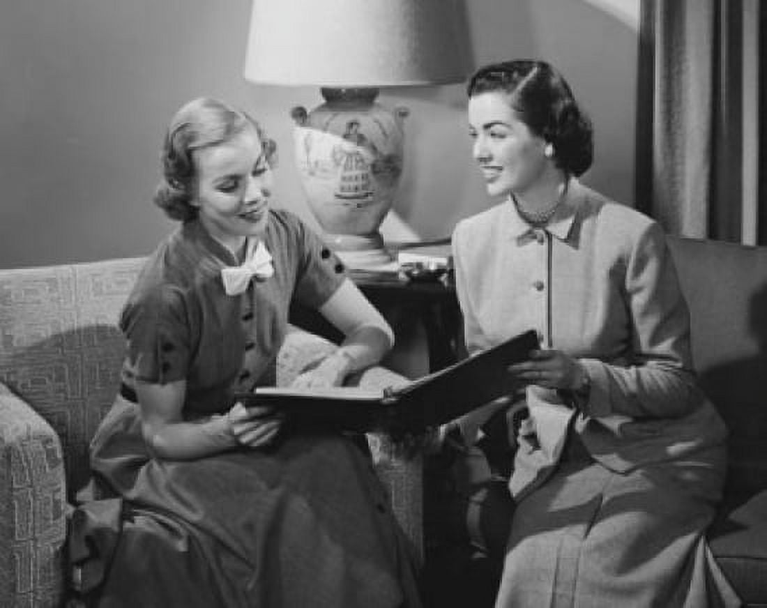 Two businesswomen holding a file Canvas Art - (24 x 36)