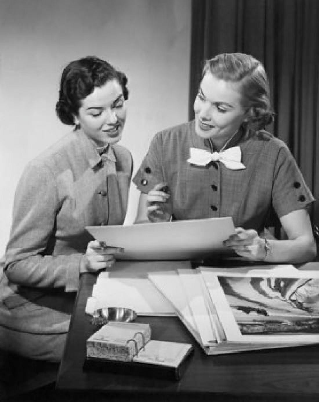 Two businesswomen looking at paintings Canvas Art -  (18 x 24)