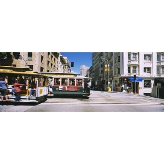 Two cable cars on a road Downtown San Francisco California USA Canvas Art - Panoramic Images (18 x 7)