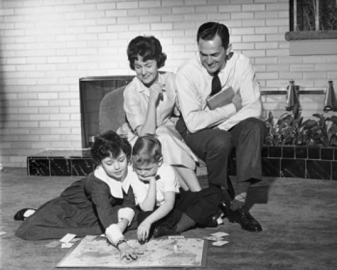 Two children playing cards with their parents looking at them Canvas Art - (18 x 24)