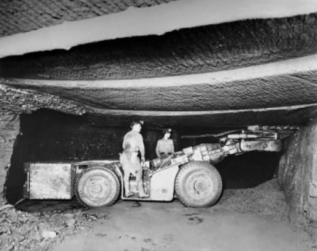 Two coal miners standing on a coal cutter in a coal mine Canvas Art - (18 x 24)