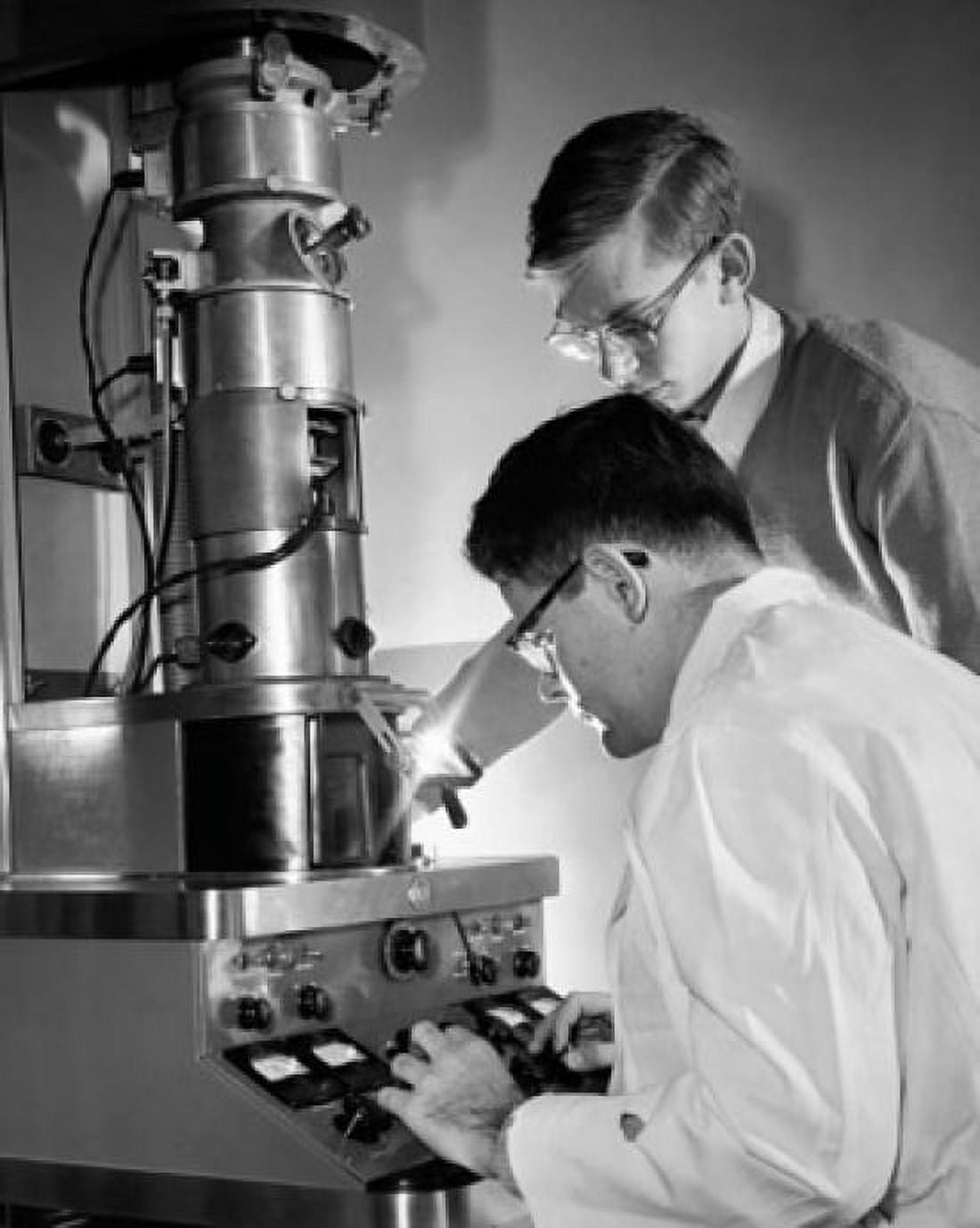 Two college students working in a laboratory Canvas Art - (18 x 24)