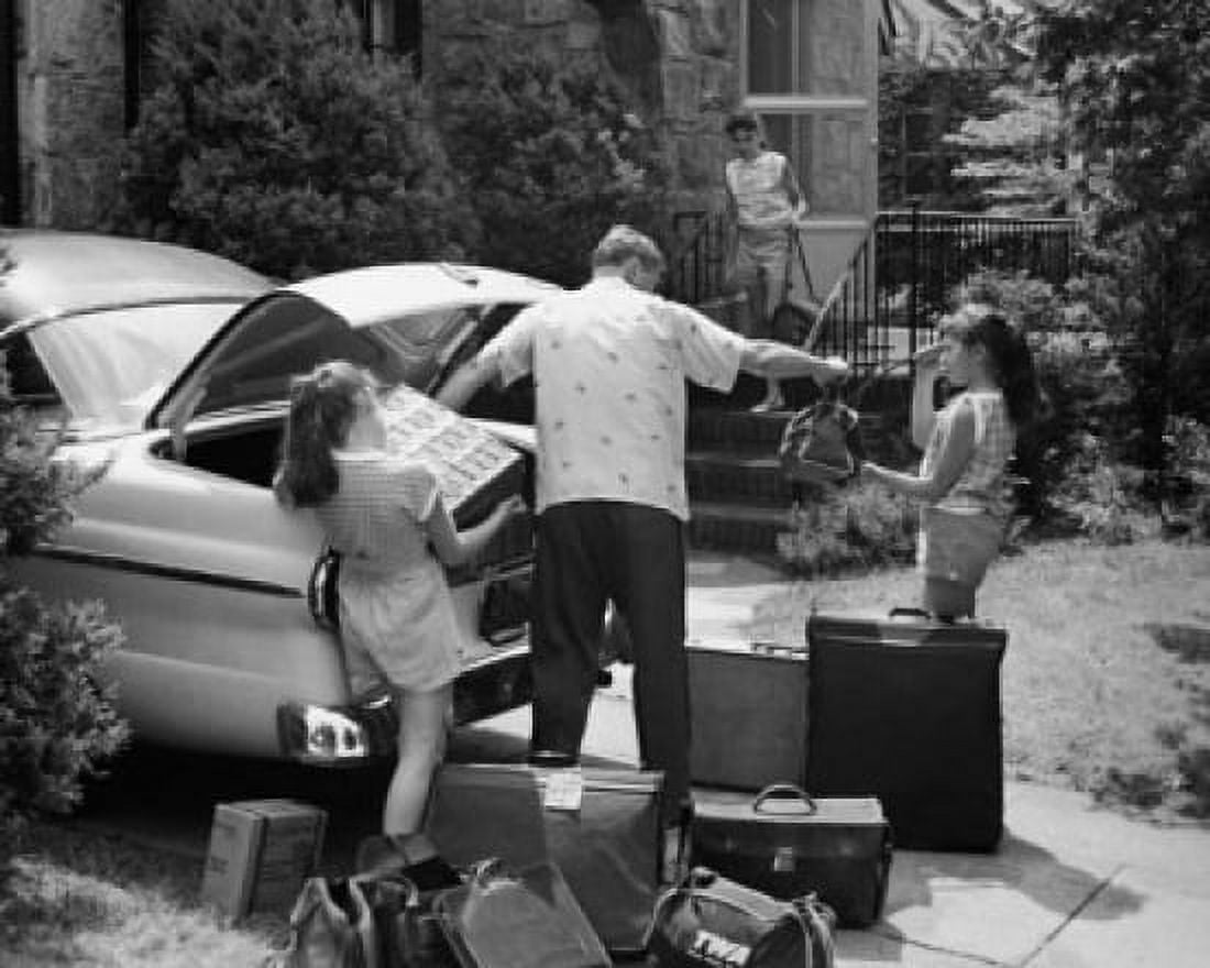 Two daughters helping their father load luggage into a car Canvas Art - (18 x 24)