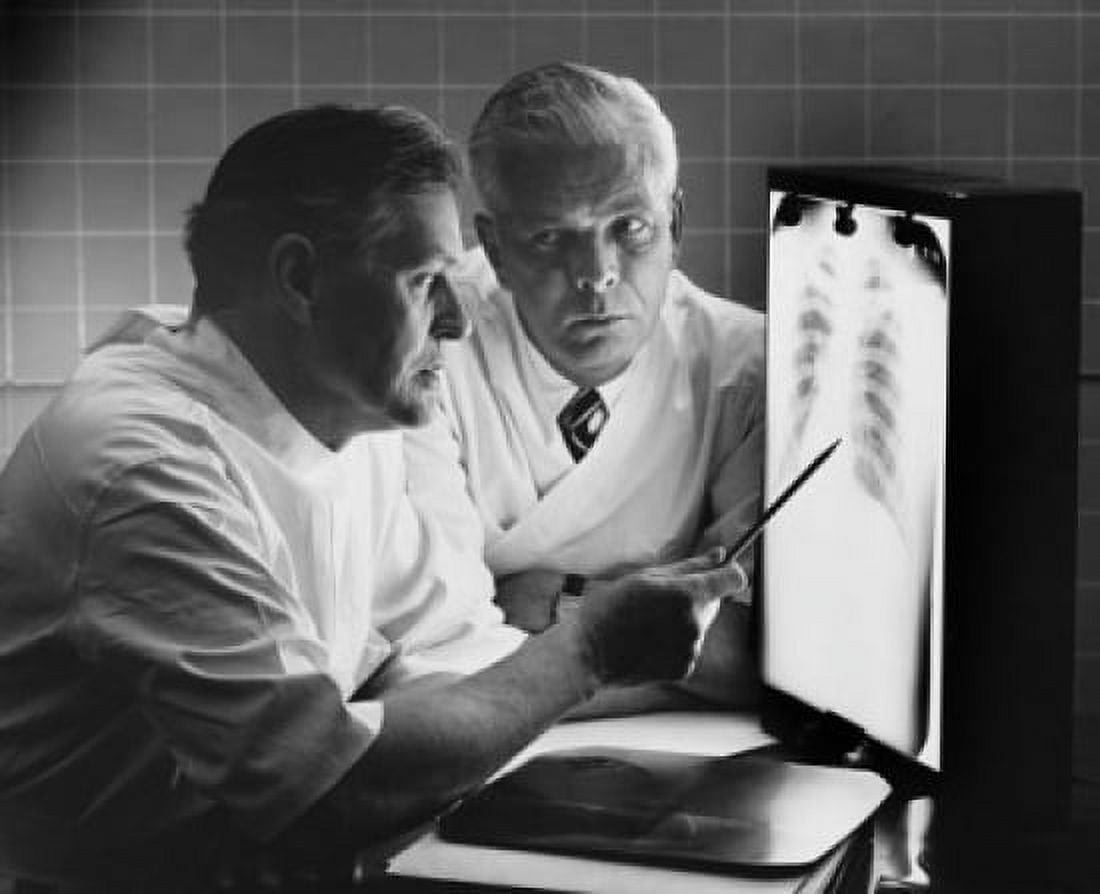 Two doctors examining an X-Ray Canvas Art -  (18 x 24)