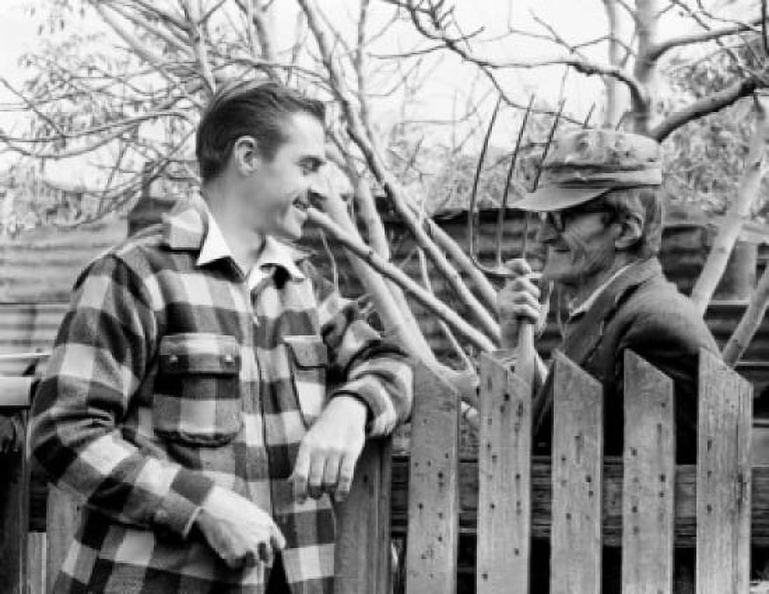 Two farmers talking by fence Canvas Art - (24 x 36)