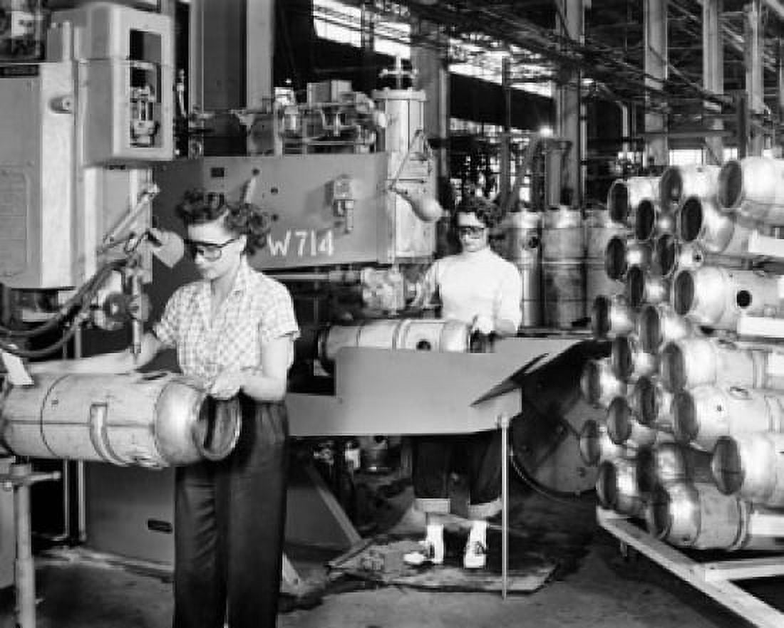 Two female workers welding combustion chambers of J47 Jet Engines with spot welding and seam welding in a factory Canvas Art - (18 x 24)