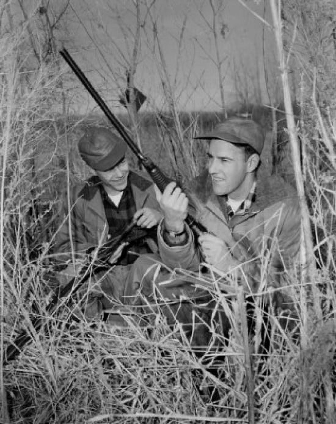 Two hunters hiding in shrubs Canvas Art - (24 x 36)