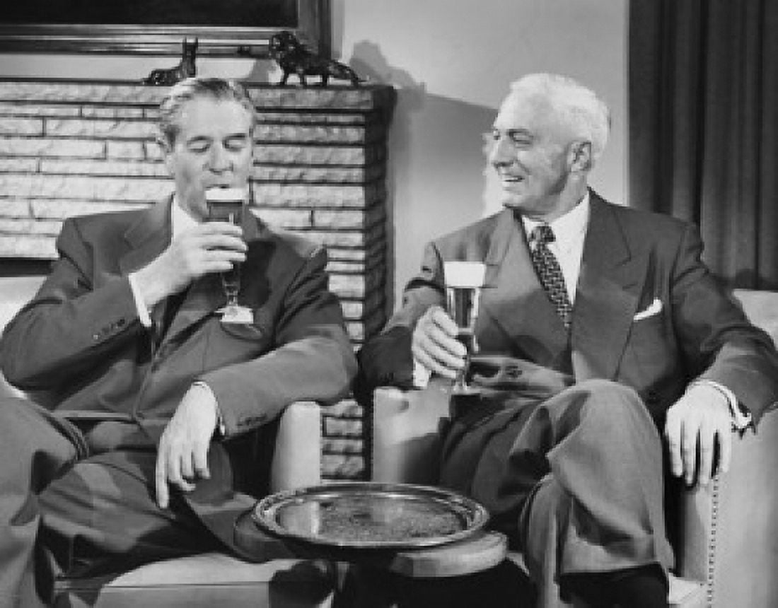Two mature men drinking beer Canvas Art - (18 x 24)