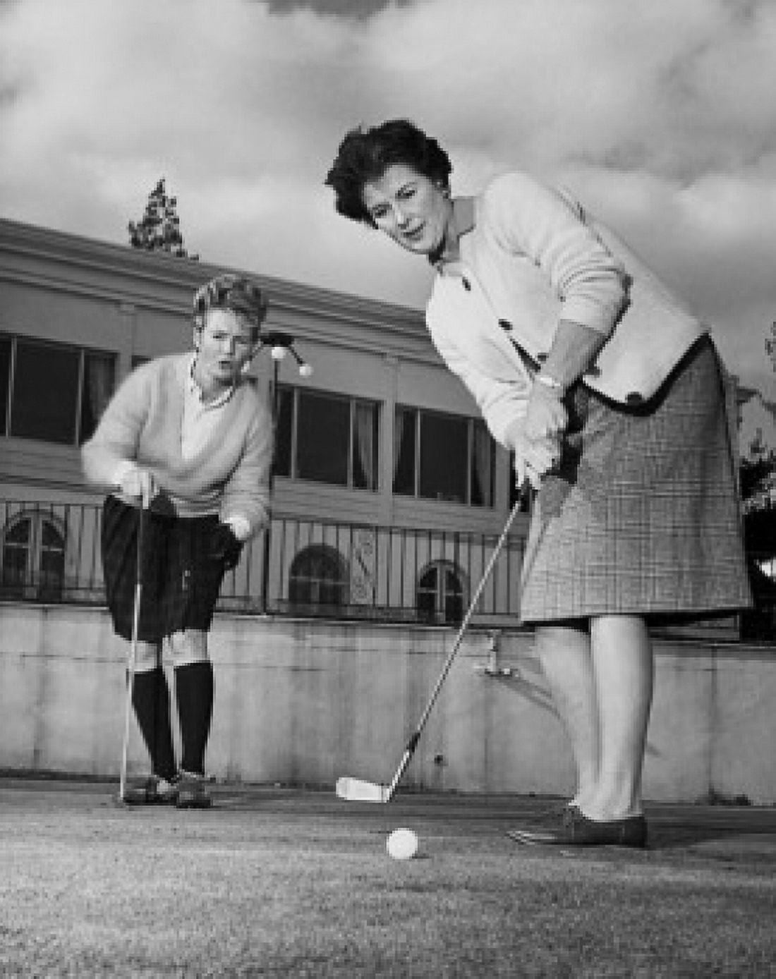 Two mature women playing golf Canvas Art - (18 x 24)