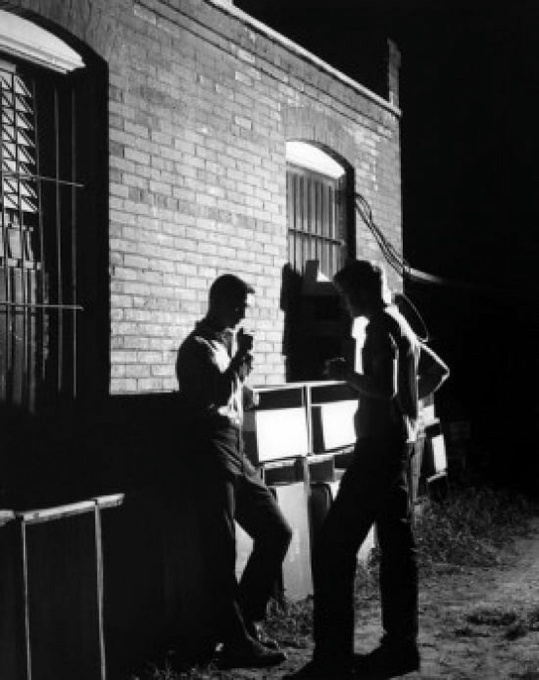 Two men smoking cigarettes outside building Canvas Art - (18 x 24)