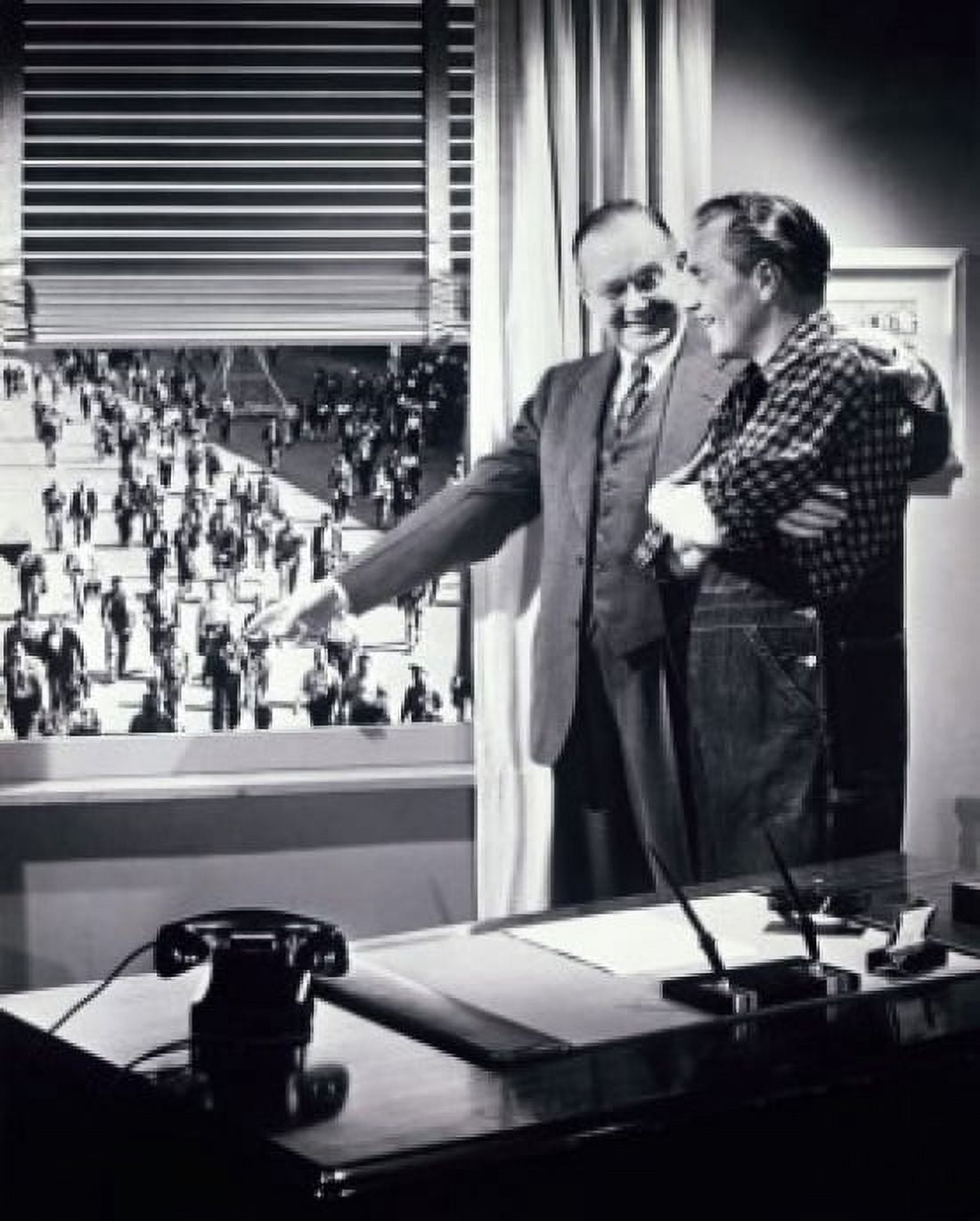 Two men standing together near a window pointing at a group people walking outside Canvas Art - (18 x 24)