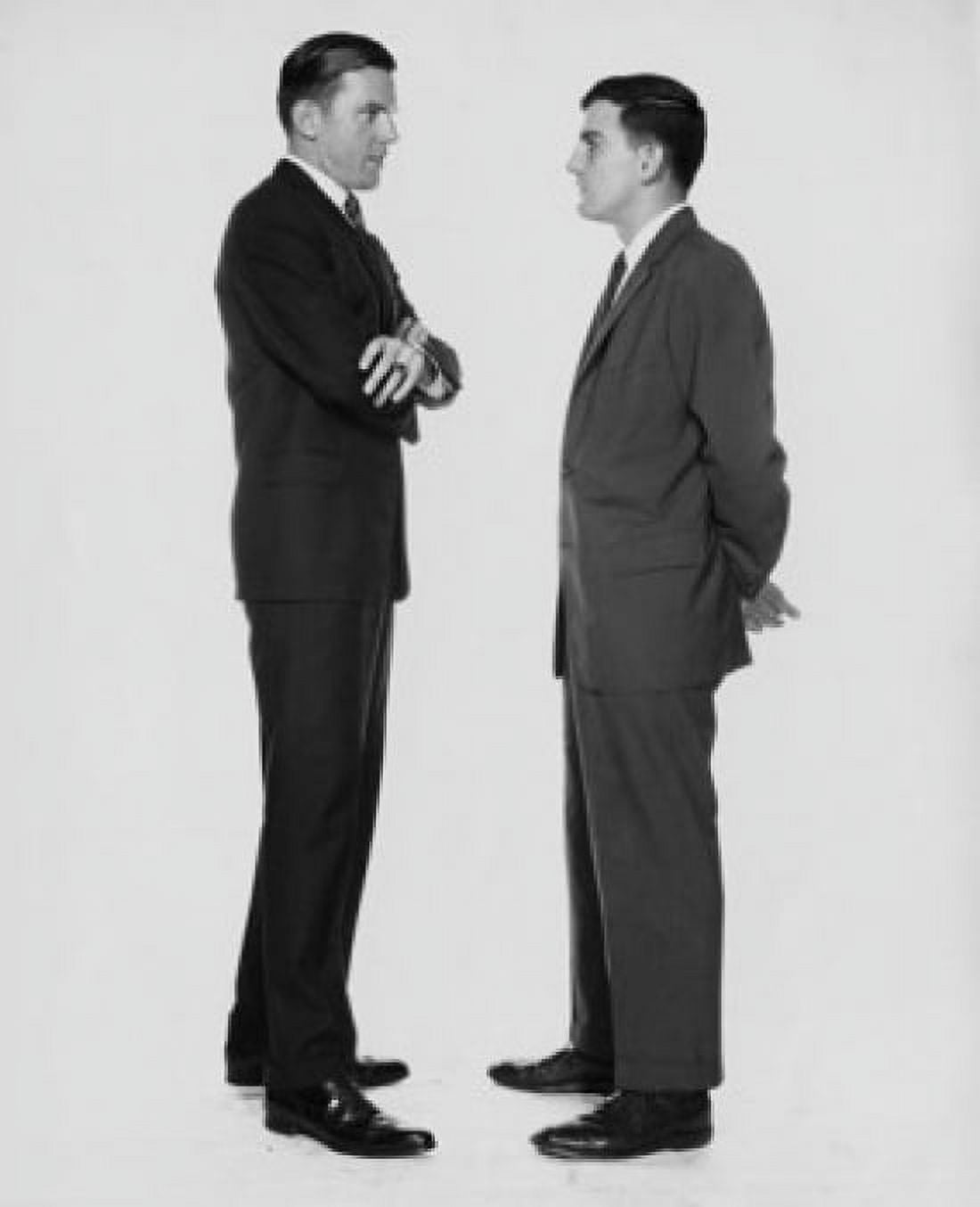 Two mid adult businessmen standing face to face Canvas Art - (24 x 36)