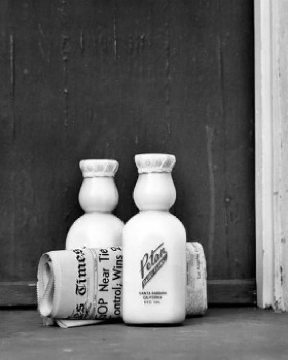 Two milk bottles with a newspaper at a doorstep Canvas Art - (24 x 36)