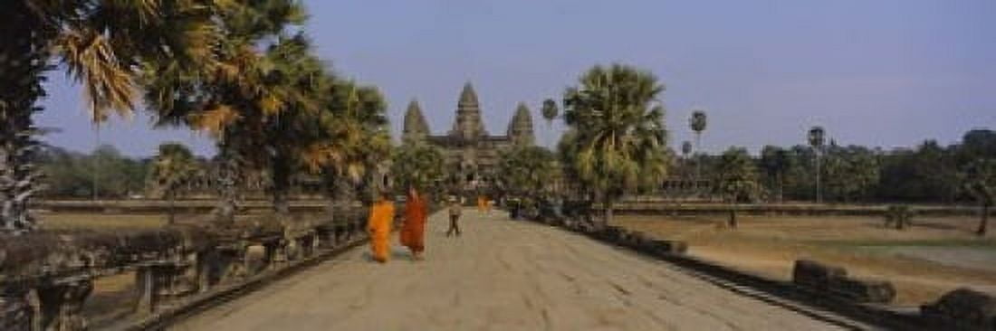 Two monks walking in front of an old temple Angkor Wat Siem Reap Cambodia Canvas Art - Panoramic Images (18 x 6)