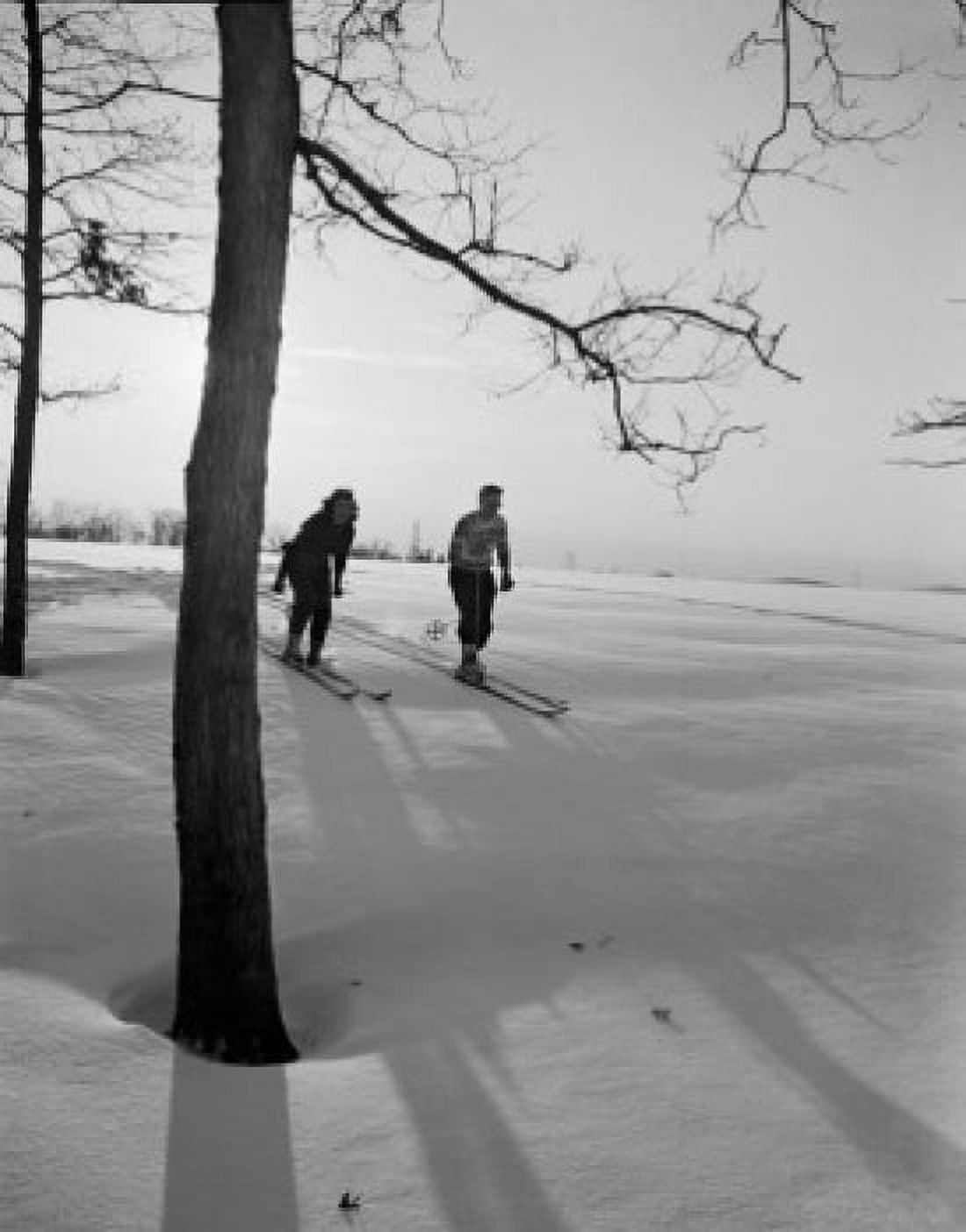 Two people skiing Canvas Art - (24 x 36)