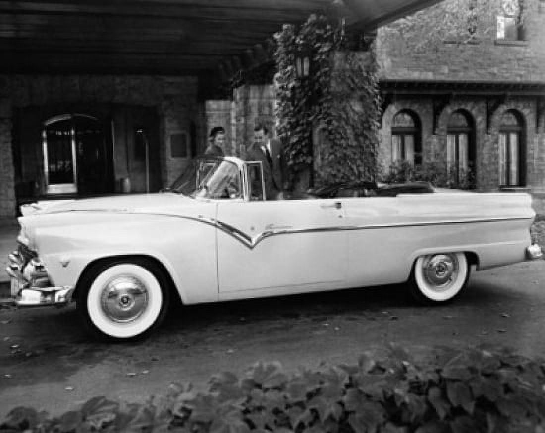 Two people standing near a 1955 Ford Canvas Art - (18 x 24)