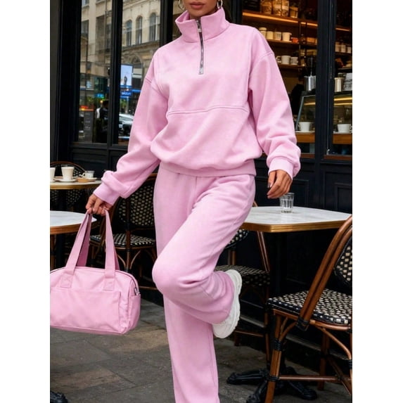 Two piece set of women's high neck sweatshirt and sweatpants with zipper