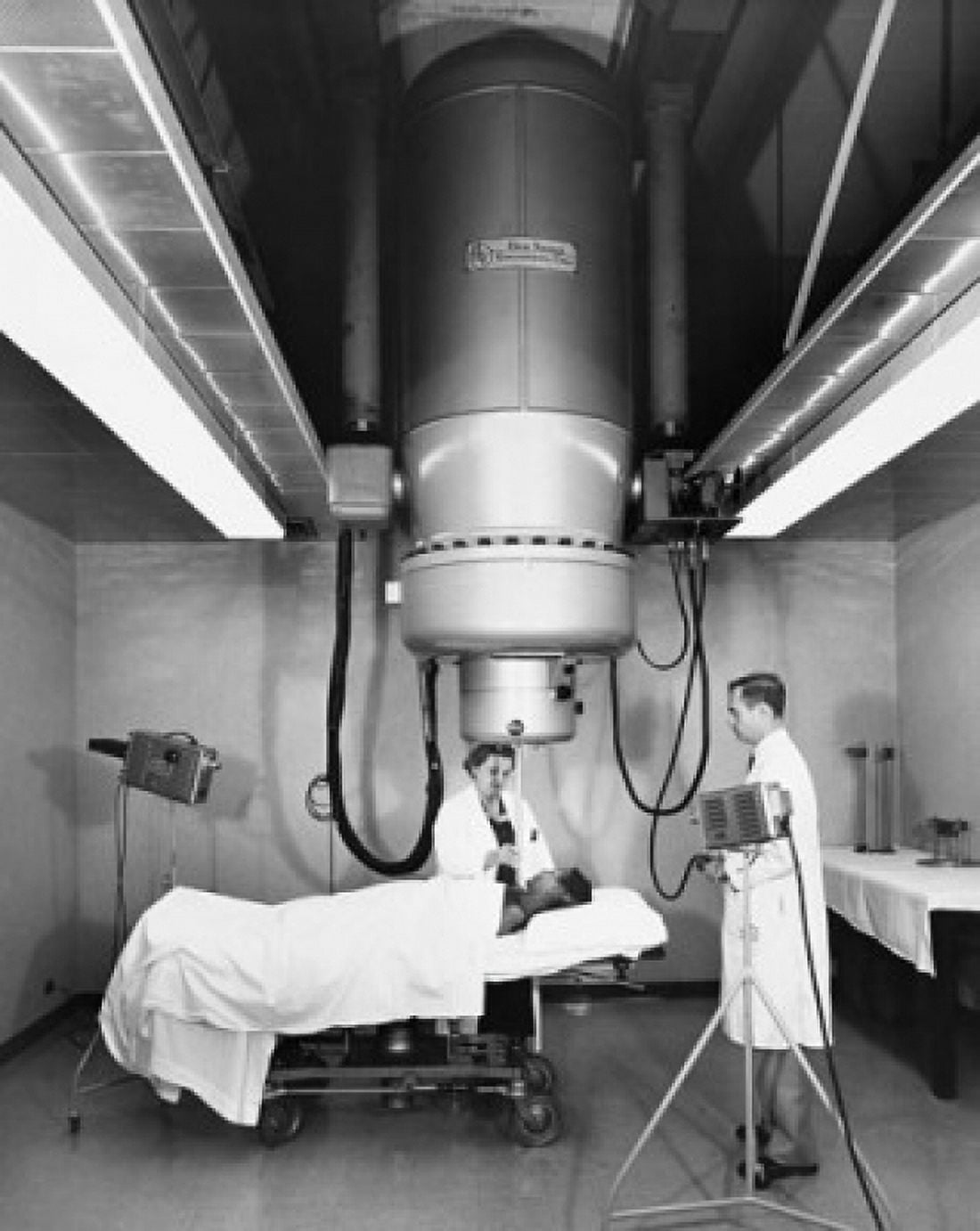 Two radiologists taking an x-ray of a patient Canvas Art - (24 x 36)