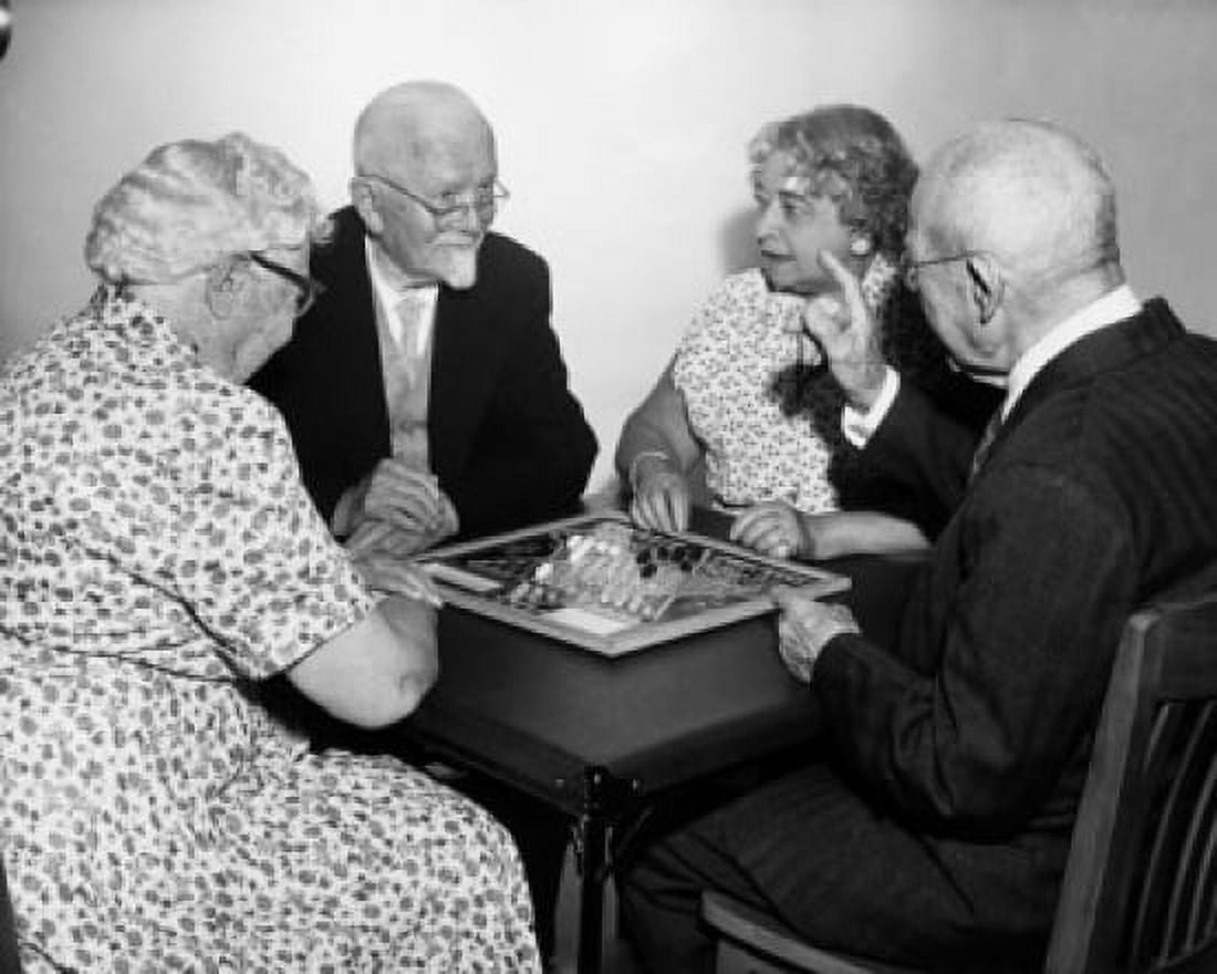 Two senior couples playing Chinese checkers Canvas Art - (24 x 36)