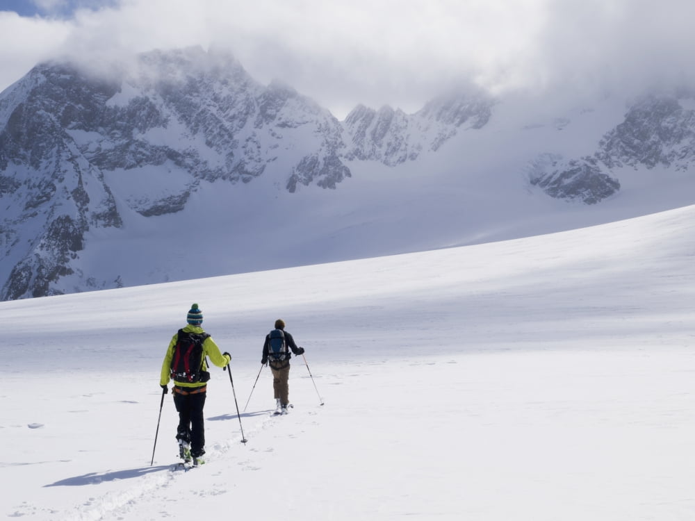 Two skiers ski touring across the Ottemma glacier Switzerland Canvas Art - Penny Kendall Design Pics (17 x 13)