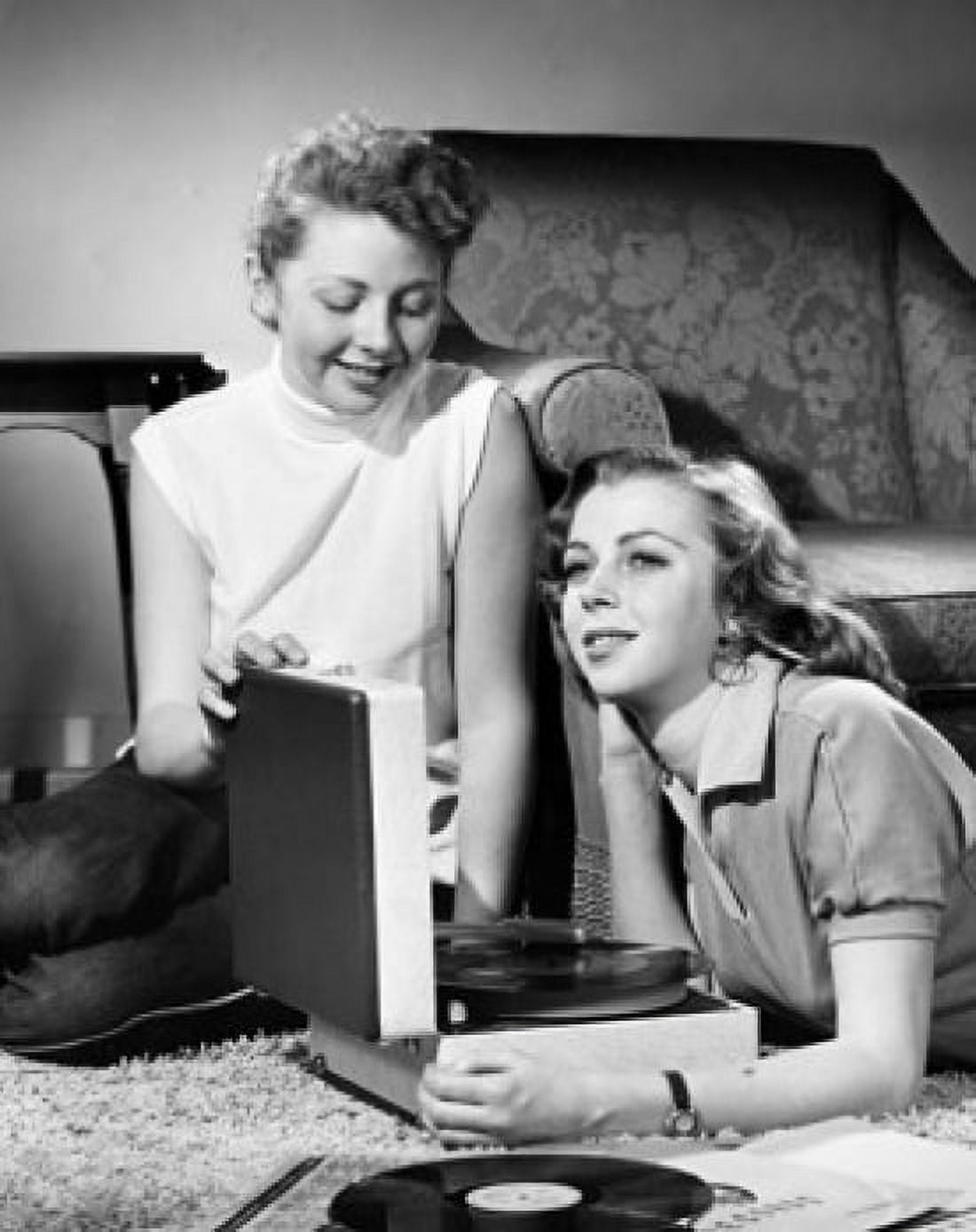 Two teenage girls listening to music Canvas Art - (18 x 24)