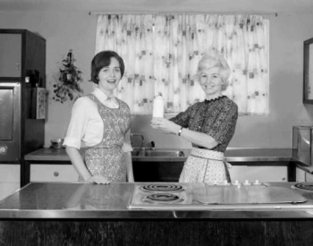 Two women in kitchen Canvas Art - (18 x 24)
