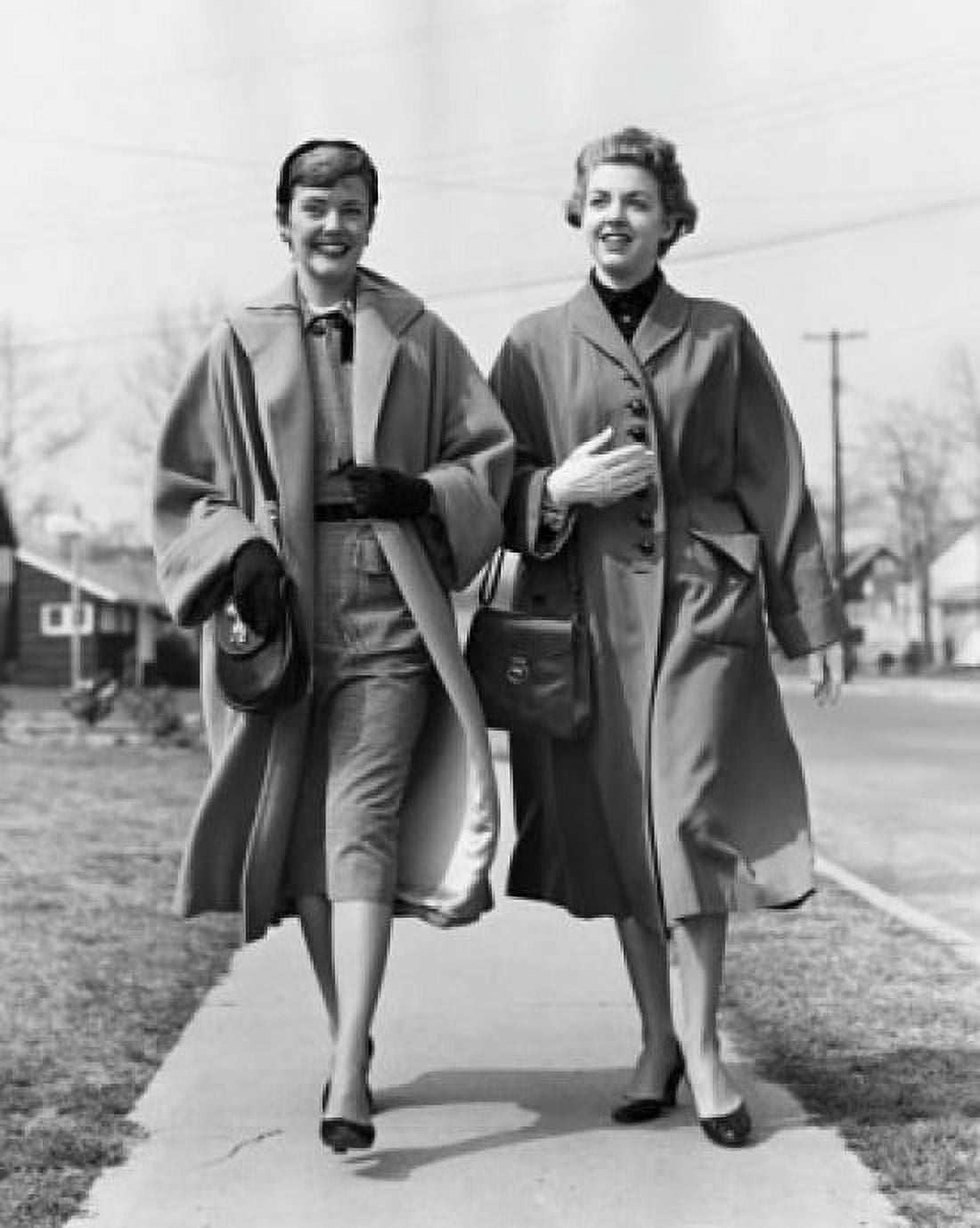 Two young women walking on a walkway and smiling Canvas Art - (18 x 24)