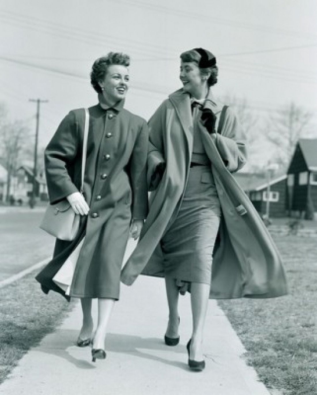 Two young women walking on pavement Canvas Art - (18 x 24)